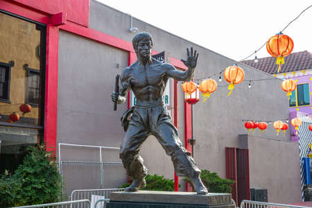 Los Angeles, California USA. June 1, 2019. Bruce Lee statue in LA Chinatown, paper lanterns decorationのeditorial素材