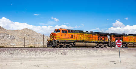California USA. May 30, 2019. Freight BNSF train in California countryside, desert background, panoramic view, sunny spring dayのeditorial素材