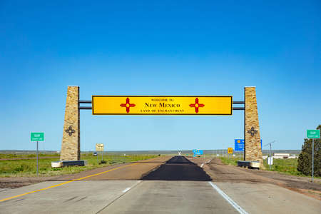 New Mexico highway, USA. May 29, 2019: Welcome to New Mexico roadsign billboard on the highway, blue clear skyのeditorial素材