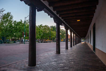 Santa Fe city, New Mexico USA. May 15, 2019. Traditional building with covered walkway in Santa Fe downtown, sunset timeのeditorial素材