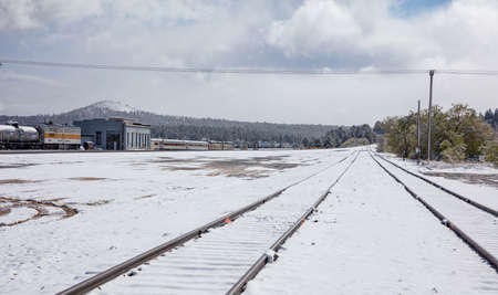 Williams Arizona USA. May 23, 2019. Grand canyon railway, train tracks covered with snow at the station.のeditorial素材