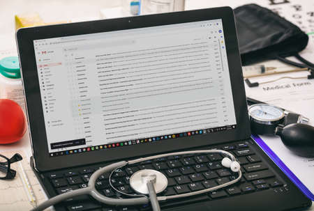 Athens, Greece. September 18, 2019. Gmail email list on the computer screen, doctors office backgroundのeditorial素材