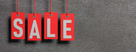 Black Friday sale. Sale text letters on red gift tags isolated against grey wall background, banner, copy space. 3d illustrationの写真素材