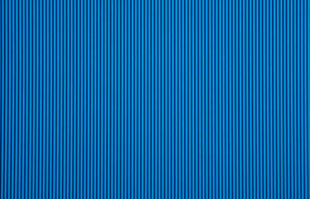 Corrugated cardboard paper blue color background and texture, copy space.の写真素材
