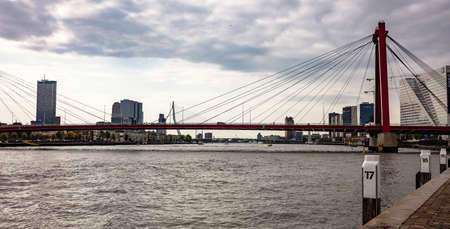 Rotterdam, Netherlands, October 13, 2019. Willem bridge against Rotterdam cityscapeのeditorial素材