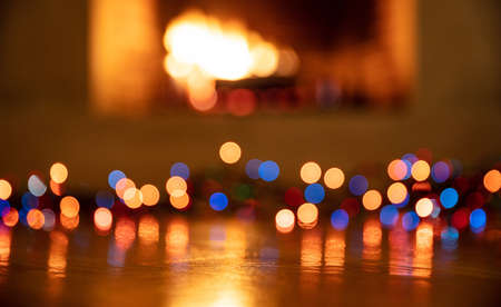 Christmas lights glowing. Xmas holiday decoration. Colorful lights garland illuminated, blur burning...