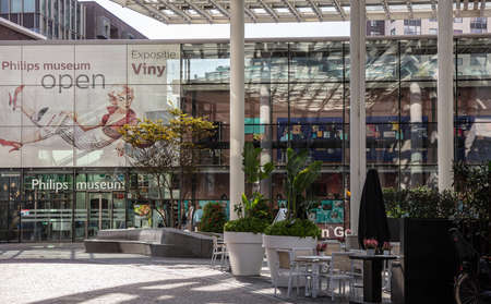 Eindhoven, Netherlands. October 10, 2019. The glass entrance of Philips Museum. The poster inform the visitors that the audio exhibition is open.のeditorial素材