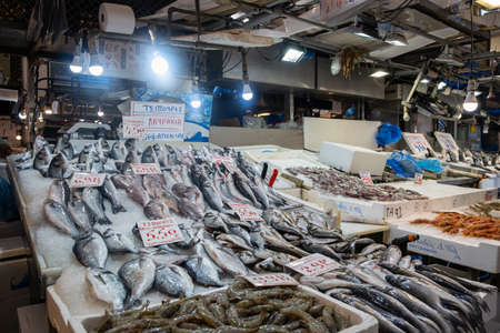 Athens, Greece. November 14, 2019. Fish and seafood variety at a fish market stall. Central food market of the city, interior viewのeditorial素材