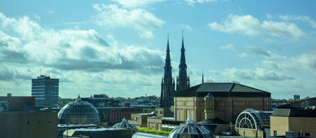 Eindhoven, Netherlands. A panoramic view from above. Rooftops of the city under a Holland cloudy sky.の写真素材