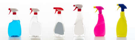 Cleaning spray bottles isolated against white background. Chemical detergents products set, Domestic household collage or business sanitary cleaningの写真素材
