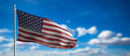 US sign, symbol. United states of America flag waving on a pole, blue sky with clouds background. 3d...