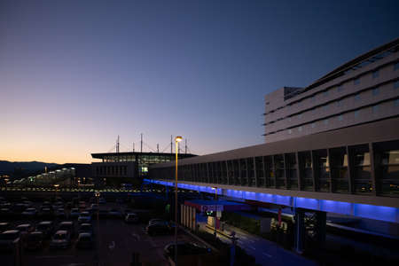 Athens Greece, March 3rd 2020. Airport terminal building at sunset. Building facade against blue...
