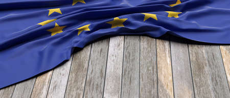 EU flag. Europe sign symbol placed on wooden table background. European Union languages, culture...