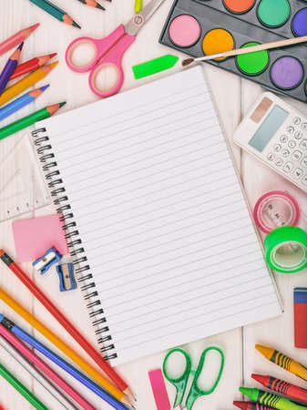 Back to school. School supplies flat lay on wood background, top view. Children creative and education concept.の写真素材