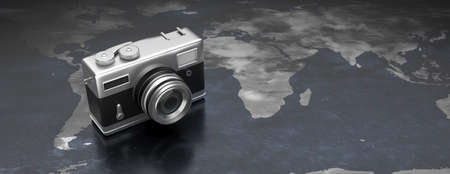 Travel photography concept. Photo camera on world map background, copy space, banner. 3d illustrationの素材 [FY310153973790]