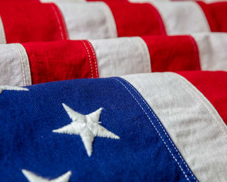 USA flag detail, closeup view. American flag background texture. Memorial day and 4th of July, Independence day conceptの写真素材