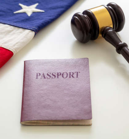 Passport, law gavel and USA flag on white background, closeup view. Immigration, United States of America visa conceptの写真素材
