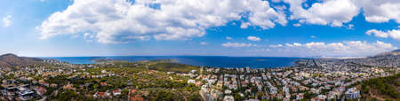 Athens Greece riviera panorama. Aerial drone view of Vouliagmeni and Kavouri coastline, high class...