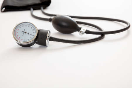 Hypertension control, Blood pressure measure, Medical sphygmomanometer on white color background, closeup view, copy space. Health cardio checkup concept.の写真素材