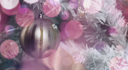 Christmas decoration, Xmas tree ornaments pastel violet color baubles closeup view, winter holiday festive background,の写真素材