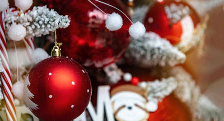 Christmas ornaments. Xmas tree decoration, red color baubles closeup view, winter holiday festive...