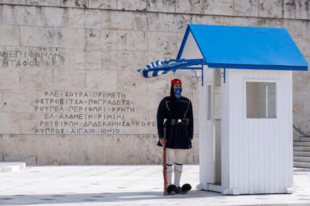 Athens Greece, November 19, 2020. Presidential guard tsolias wearing a COVID 19 protective face...