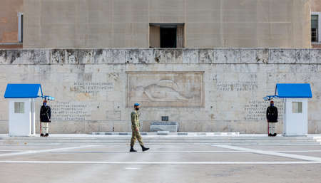 Athens Greece, November 19, 2020. Presidential guards tsoliades wearing COVID 19 protective face...