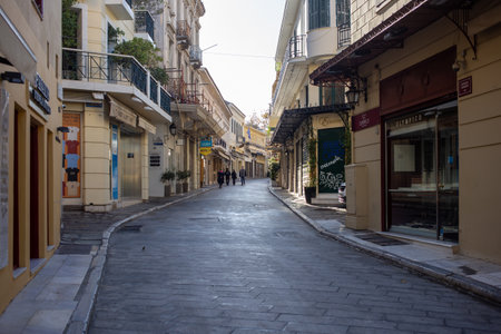 Athens, Greece. December 5 2020. Shops closed in empty Adrianou street, city center, Plaka,...