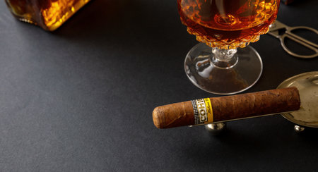 Athens Greece, December 30, 2020. Cohiba Cigar, cuban premium quality robusto and alcohol brandy or...