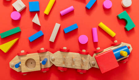 Train children toy and blocks, creative preschool kids play. Wooden colorful blocks construction on...