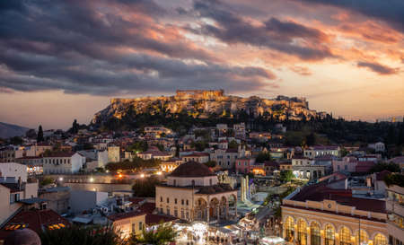 Athens, Greece. Monastiraki square and cityscape at sunset. Aerial panoramic view of the city and illuminated Acropolis rock. Cloudy colorful sky backgroundのeditorial素材