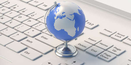 Globe planet Earth, School world map sphere on metal stand, white computer keyboard background. Online map, digital cartography, geography class, education. 3d illustrationの写真素材