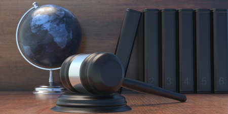 School Globe planet Earth, judge auction gavel and books on table, International law studies and...