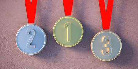 Winners medals set. Sports awards, first second and third place, hanging with red ribbons on wall background. 3d illustrationの写真素材
