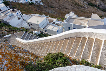 Serifos island, Cyclades Greece. High angle view of weathered stone stairs on rocky mountain over...