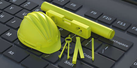 Construction hardhat, level instrument caliper and accessories on computer keyboard background....