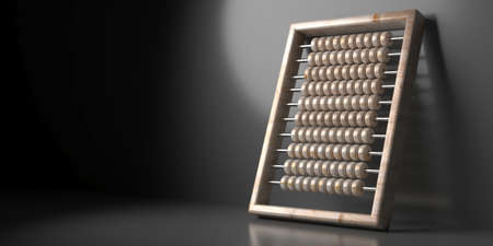Count abacus with wooden beads and frame against black wall, dark background, light on the abacus....