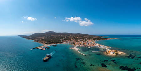 Elafonisos Peloponnese. Greece. Ferry departing from harbor to Pounta Lakonia, aerial drone view,...