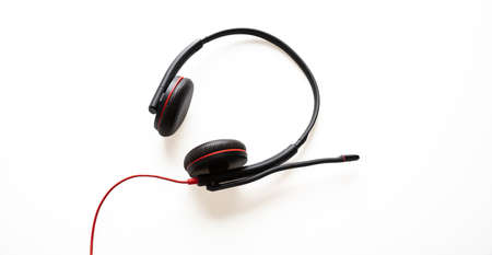 Helpdesk headset isolated on white background. Communication support, call center and customer...