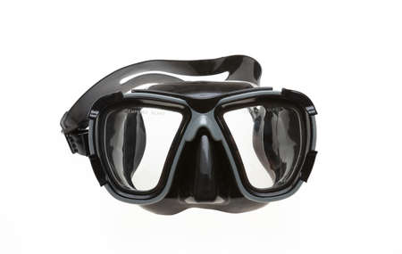 Diving mask isolated cutout on white background. Black scuba mask with tempered glass, snorkelling swim and dive sea equipment.の写真素材
