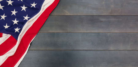 USA flag on blue wooden background. US of America sign symbol, Memorial, 4th of July, Independence...