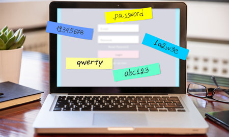 Password weak, bad cyber security. Laptop screen with memo sticks. Password management, strong and secure protectionの写真素材