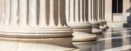 Classical columns white marble. Pillars in a row. Athens Greece Academy neoclassical building...