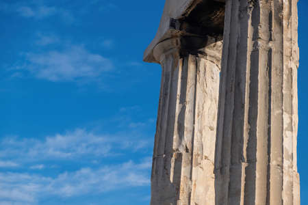 Roman Agora, Athens Greece. Gate of Athena Archegetis columns detail, blue sky background. Ancient remains at Plakaの写真素材