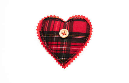 Valentine day, Love symbol, design element. Heart red black checkered cloth and button isolated on...