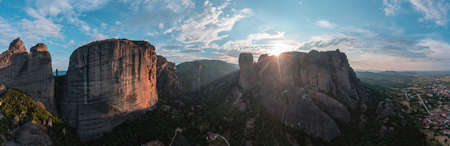 Meteora Greece rock formations at sunrise panorama. Monasteries built on top of rocks.の写真素材
