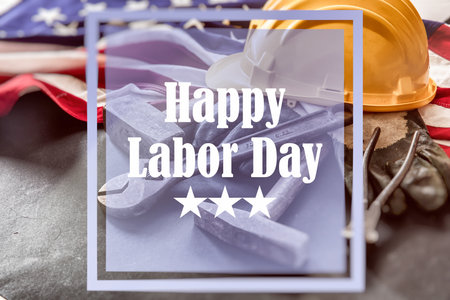 Happy Labor Day text, USA flag and construction tools. United States America holiday celebrationの写真素材