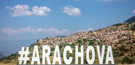 Arachova village at the Parnassos Mountain Greece. Name of the town, white text, travel destinationの写真素材