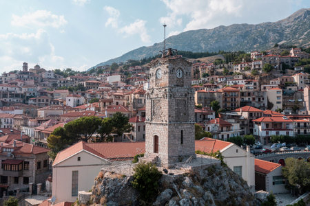 Arachova Greece, Traditional mountain town aerial drone view. Tiled roof houses and stone tower clock, tourist resort in Boeotia.の写真素材