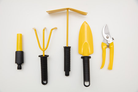 Gardening yellow set. Garden tools isolated on transparent background, view from above,の写真素材